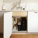 ARNO under-sink boiling water tap system with mechanical controls installed in modern kitchen cabinet