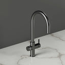 ARNO Halo 6 in 1 boiling water tap brushed gunmetal side view on marble countertop standby mode