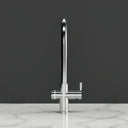 ARNO Halo 6 in 1 instant boiling water tap chrome cross handle on dark background